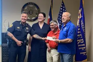 $2635 Donation to Douglass County Sheriff Torch Run for Special Olympics